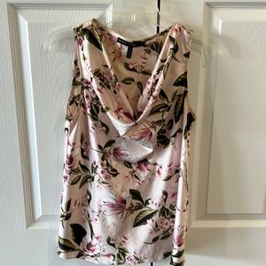 Pink flowered sleeveless top.